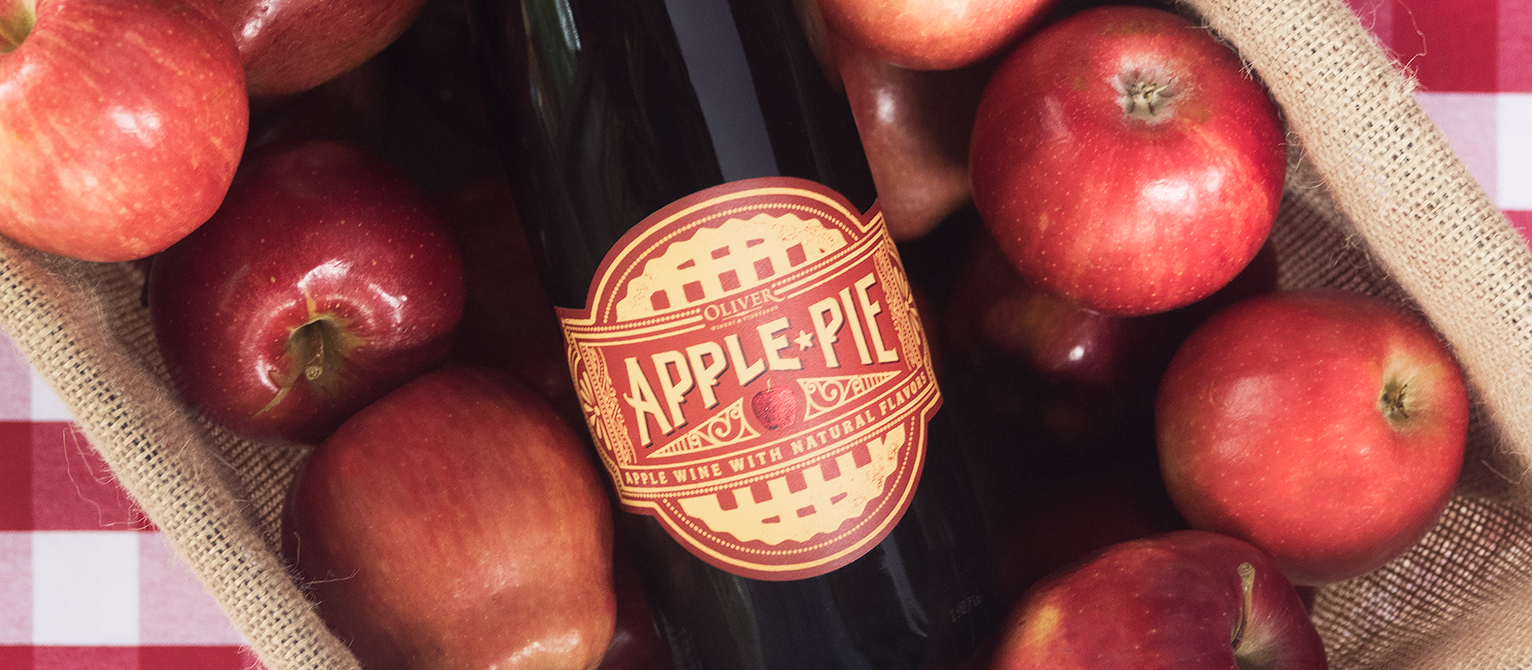 apples in basket with apple pie wine
