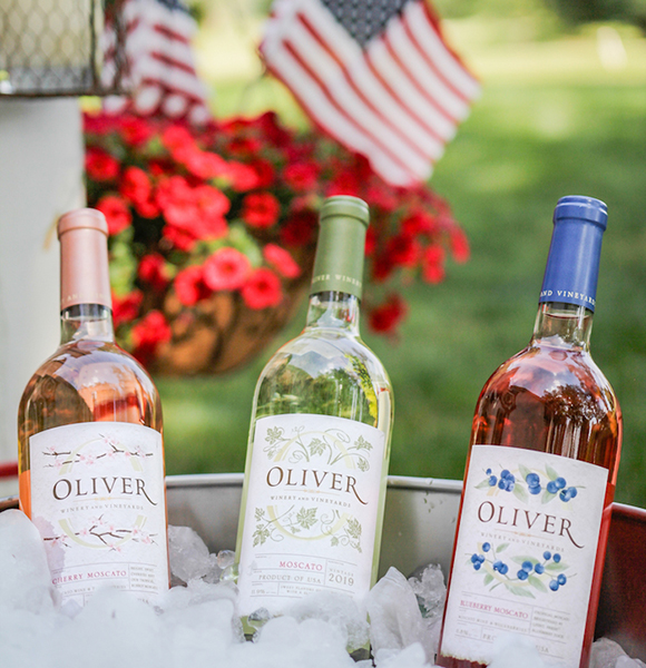 Oliver Winery Moscato, Cherry Moscato, and Blueberry Moscato in an ice bucket