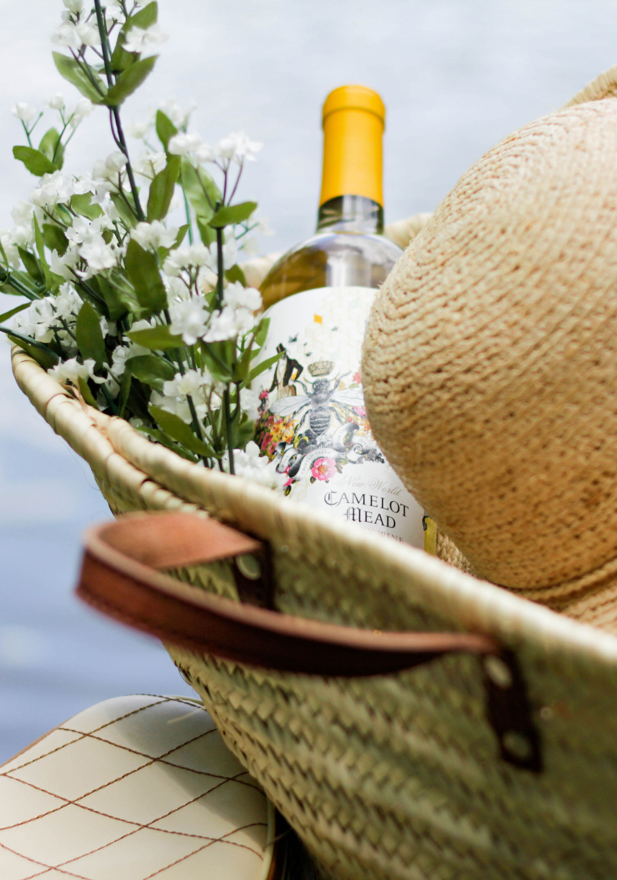 Oliver Winery Camelot Mead in a yellow bicycle basket