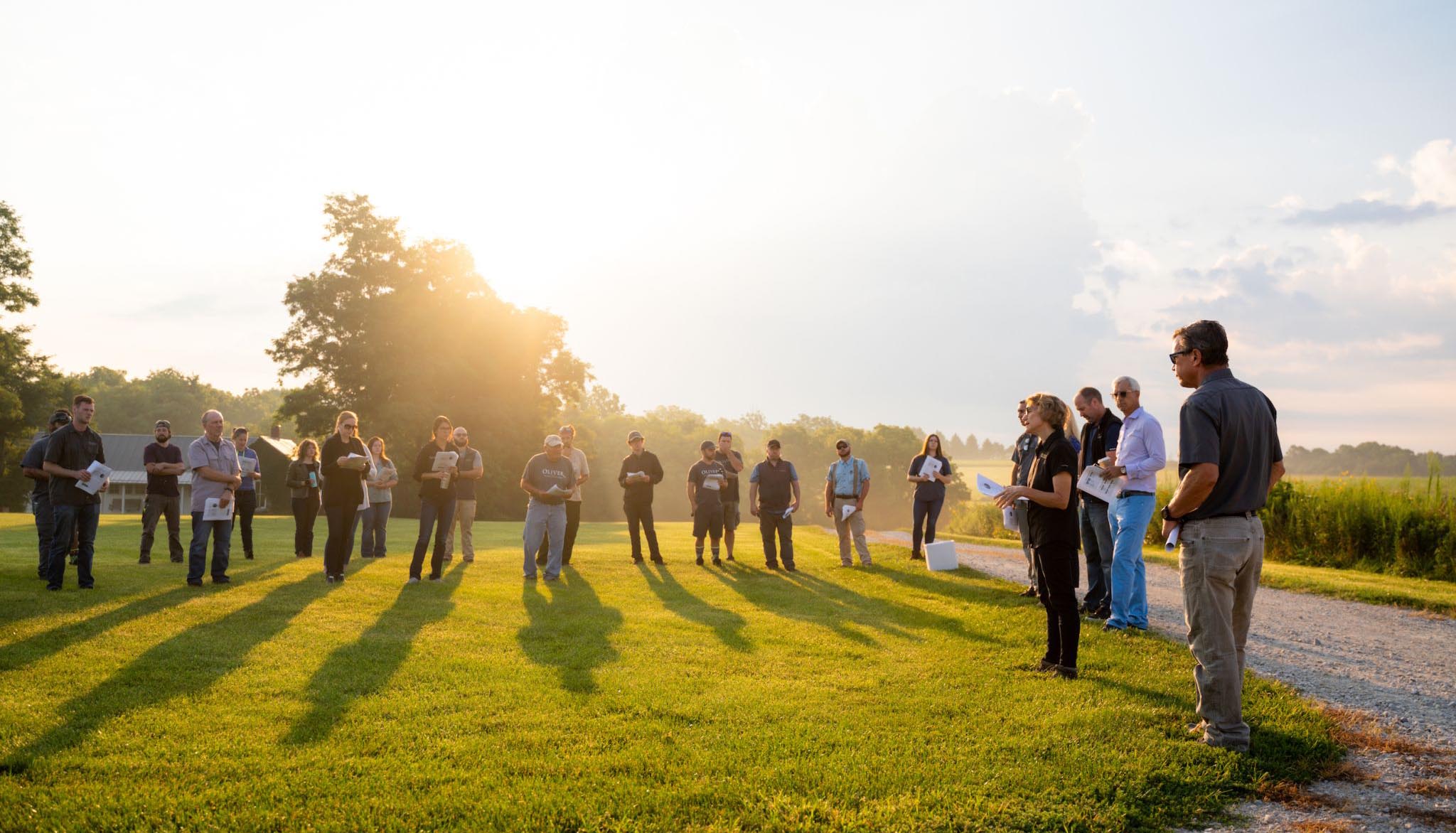 Oliver Winery staff gather at Creekbend Vineyard