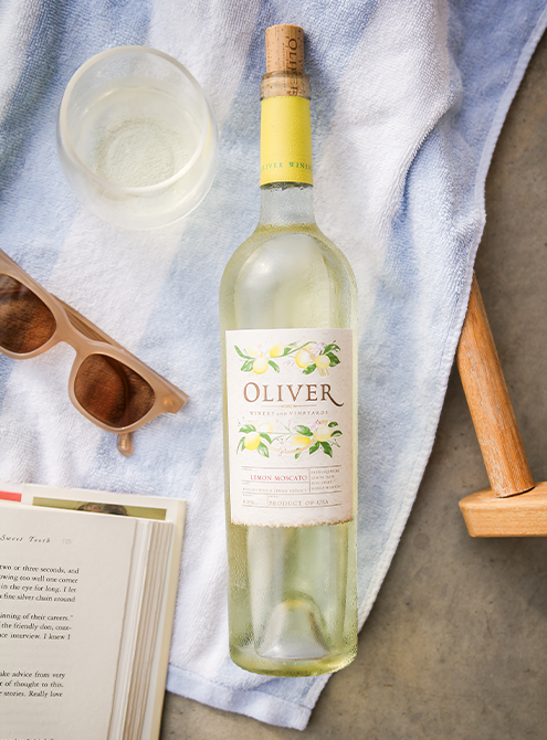 Refreshingly real Oliver Lemon Moscato at a relaxing poolside setting.