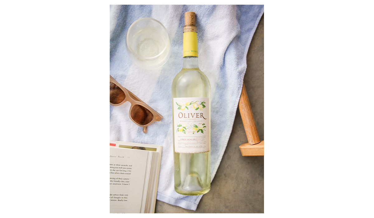 Refreshingly real Oliver Lemon Moscato at a relaxing poolside setting.
