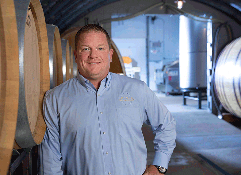 Oliver Winery VP of Wholesale Sales Chris Hibbert in the cellar.
