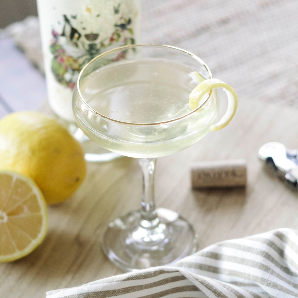 Camelot Mead in gin cocktail in coupe glass with lemon garnish