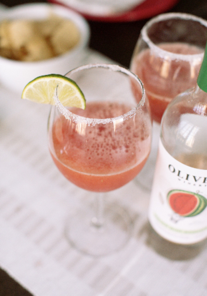 Melon Mint Frosé Slushee garnished with lime slice