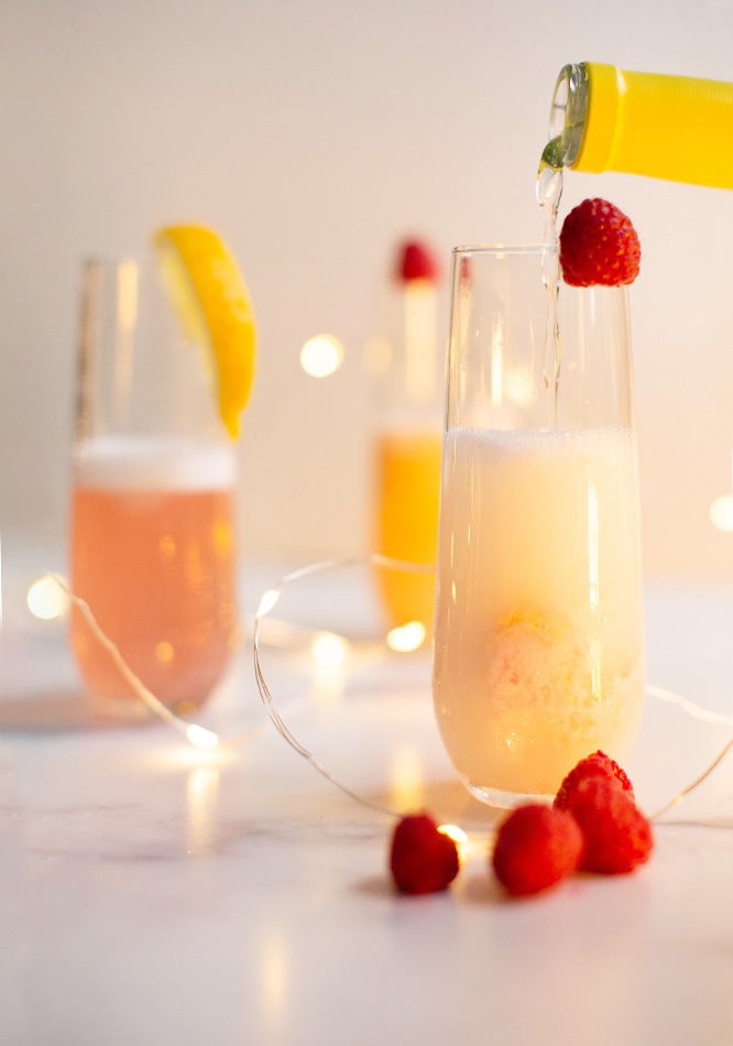 Real Fruit Moscato Sherbet Mimosa's with fresh fruit garnish.