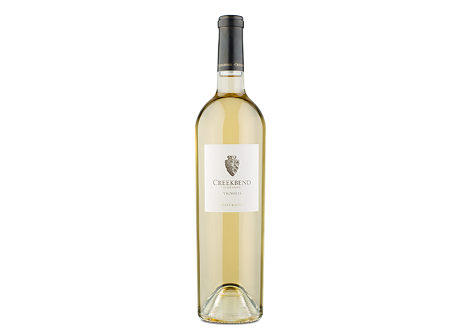 Creekbend Vignoles is an estate-grown tropical, semi-sweet white wine.