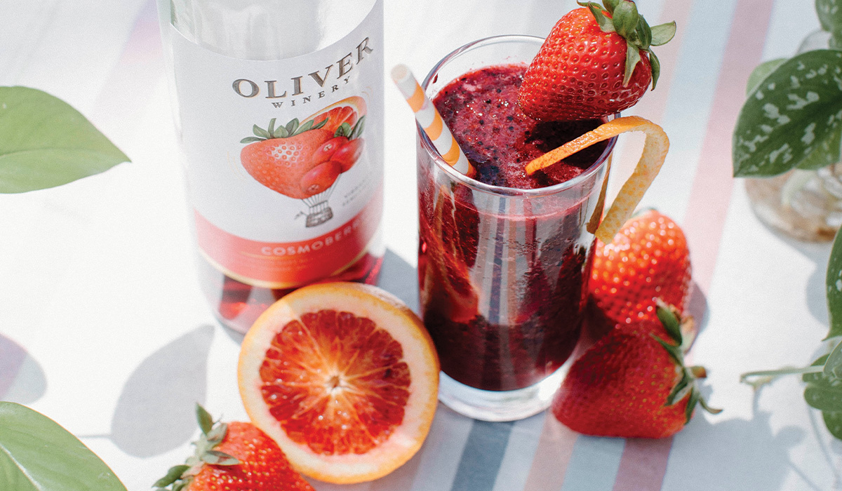 Frosé Sangria with Oliver Winery's Cosmoberry, garnished with strawberries & blood orange.