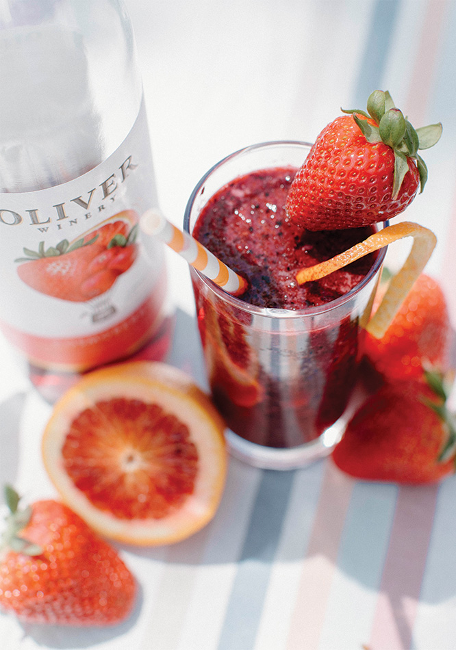 Frosé Sangria with Oliver Winery's Cosmoberry, garnished with strawberries & blood orange.