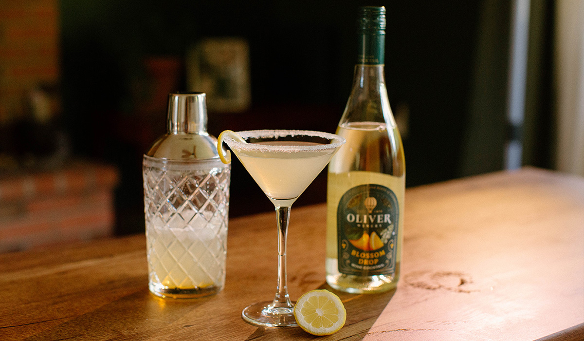 Oliver Winery's newest release, Blossom Drop, in a simple Lemon Drop cocktail at golden hour.