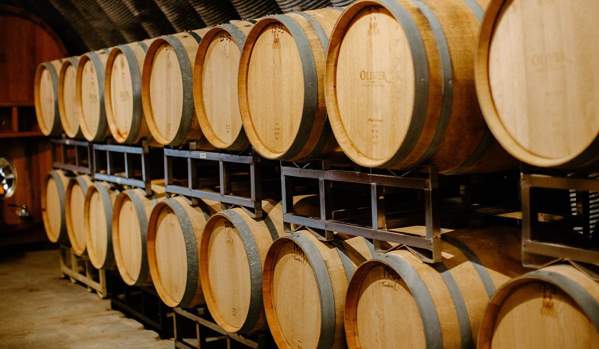Barrels line the inside of the Oliver Winery cellar.