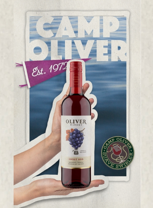 Oliver Winery Camp Oliver Hand with Bottle of Oliver Sweet Red