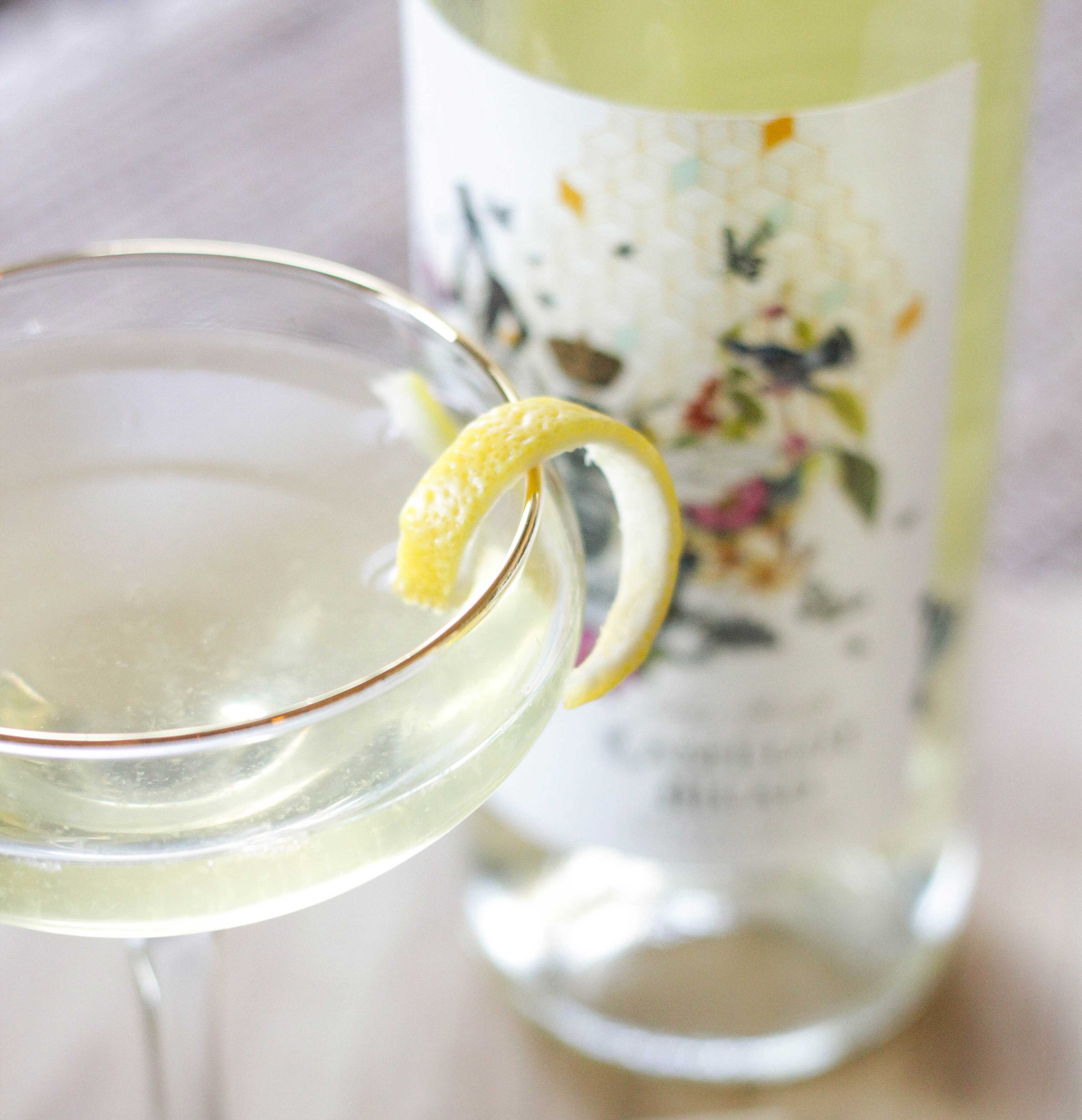Camelot Mead Bees Knees cocktail in champagne glass.
