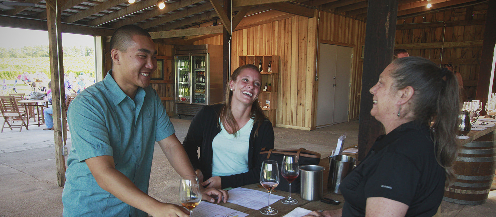 Guests enjoy live music at Oliver Winery's Creekbend Vineyard during Cork & Fork.