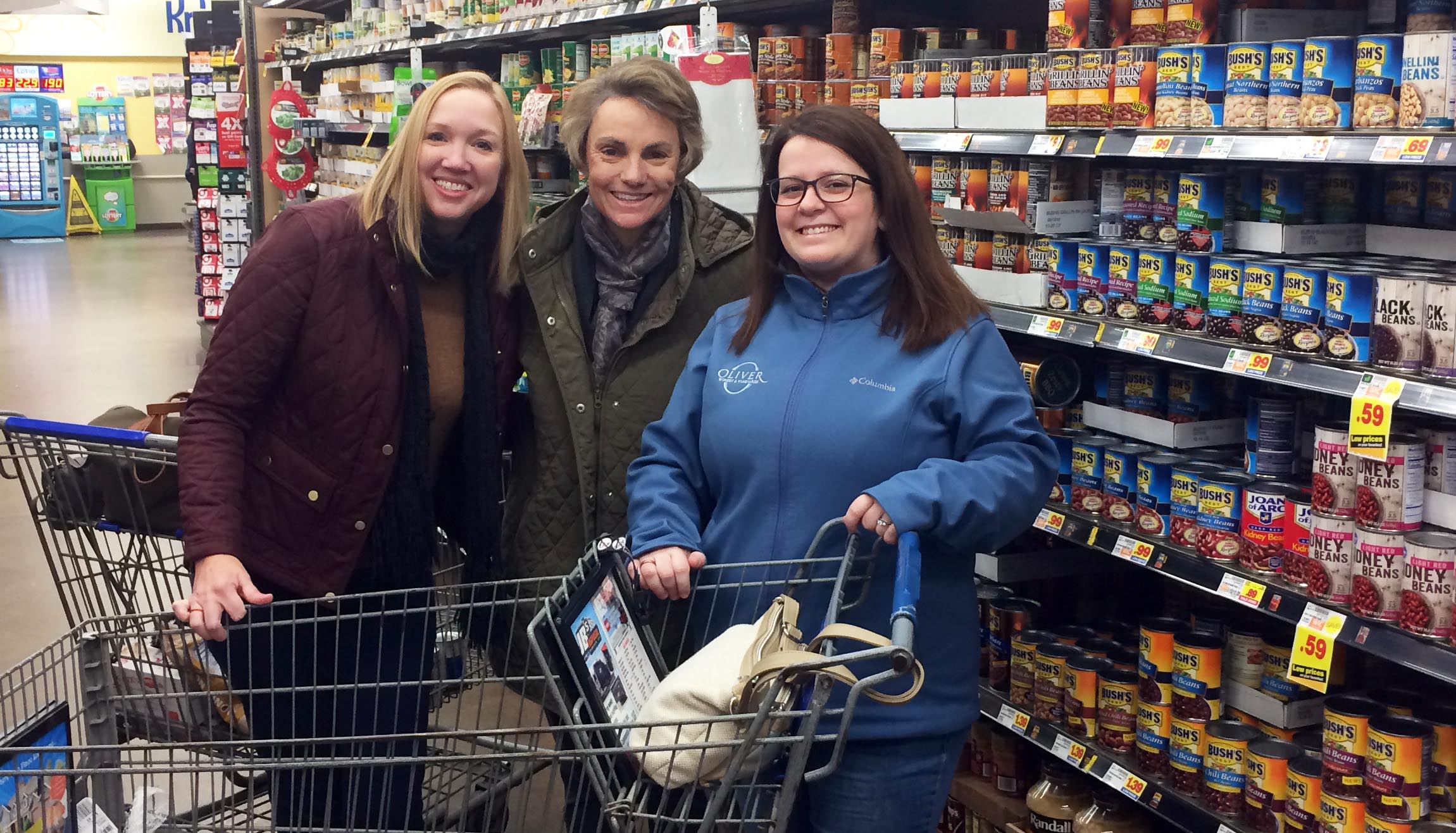 Staff members wrap gifts for families as part of our annual Monroe County United Ministries outreach. 